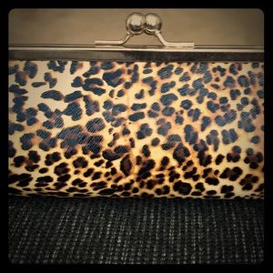 Leopard clutch never been used tags still on it